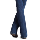 Women's Ariat mid rise boot cut jean in Marine which is a medium wash. Bottom view showing jean opening over boots. 
