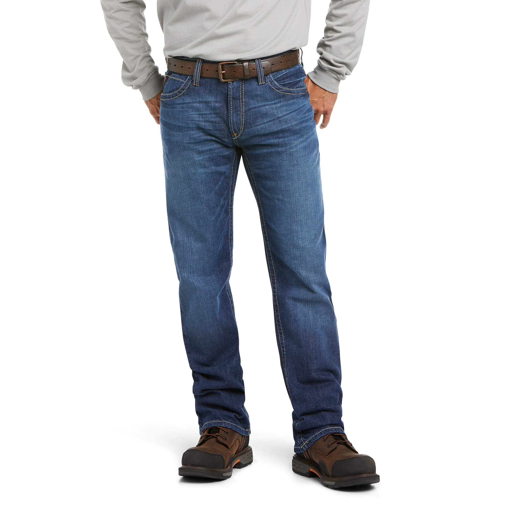 Men's Ariat FR boot cut jean in a M4 relaxed fit, this jean is a medium wash. Front View
