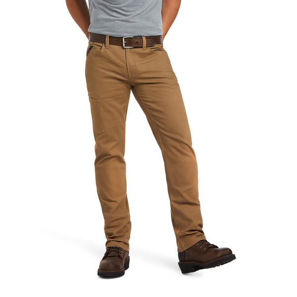 Men's Ariat field khaki Rebar pants with scoop front pockets and a right coin pocket that has an angled Ariat logo fabric strip for reinforcement. Also shows right thigh utility pocket. Front right view.