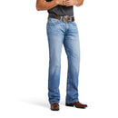 Men's Ariat M4 relaxed fit boot cut jean in a light wash. Front view