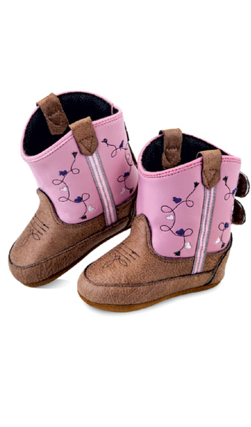 Old West Poppet style infant/toddler sizes western boot in tan with pink top and velcro closure on back. Side view of a pair.