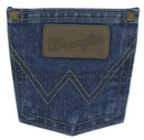A close-up view of the back pocket of a Wrangler boys' George Strait Cowboy Cut original fit jeans showing the top rivets, faux leather logo patch, and the "W" stitching.