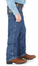 Sideview of little boys' Wrangler George Strait heavyweight stone denim cowboy cut original fit jeans.
