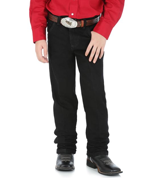 Front view of a boy wearing overdyed black Wrangler cowboy cut jeans with a five-pocket design and flat copper rivets.