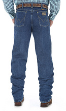 A back view of a man wearing Wrangler men's George Strait Cowboy Cut relaxed fit jeans with a high-rise waist and a straight leg.