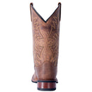 A heel view of a women's Laredo 5602 11 inch tan leather boot with a square toe and floral embossing on the shaft.