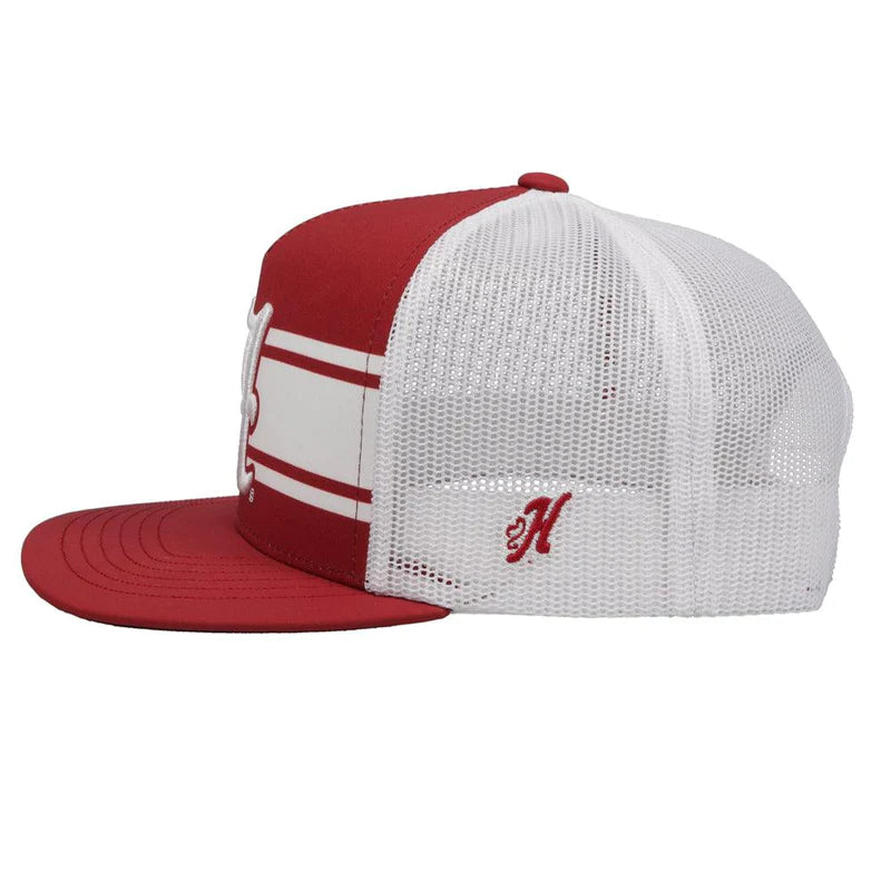 Hooey x University of Alabama A logo Crimson and White snapback trucker cap. Embroidered A logo on front, small H logo on side, white mesh back with red snapback with small Alabama tag. Side view stock photo