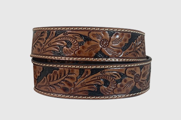 A brown floral hand tooled leather belt.
