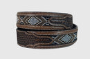 A brown Crazy Horse leather belt with faux beading, basket weave tooled end tabs.