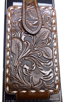 A brown floral embossed leather cell phone case with ivory buck laced edges and a swivel clip.