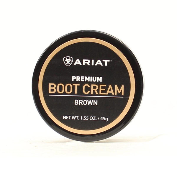 A container of Ariat premium brown boot cream. Front view.