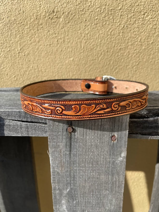 Embossed leather belt strap for toddler belt. Back view.