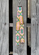 Turquoise, Pink, and Mustard geometric print purse strap. 