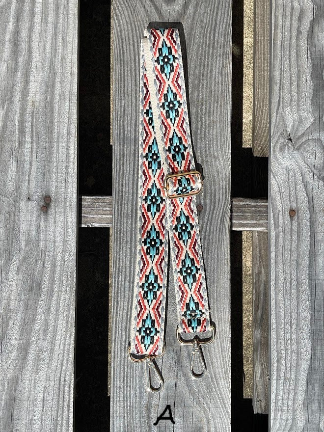 Purse strap with Turquoise, Red, and Grey design. 