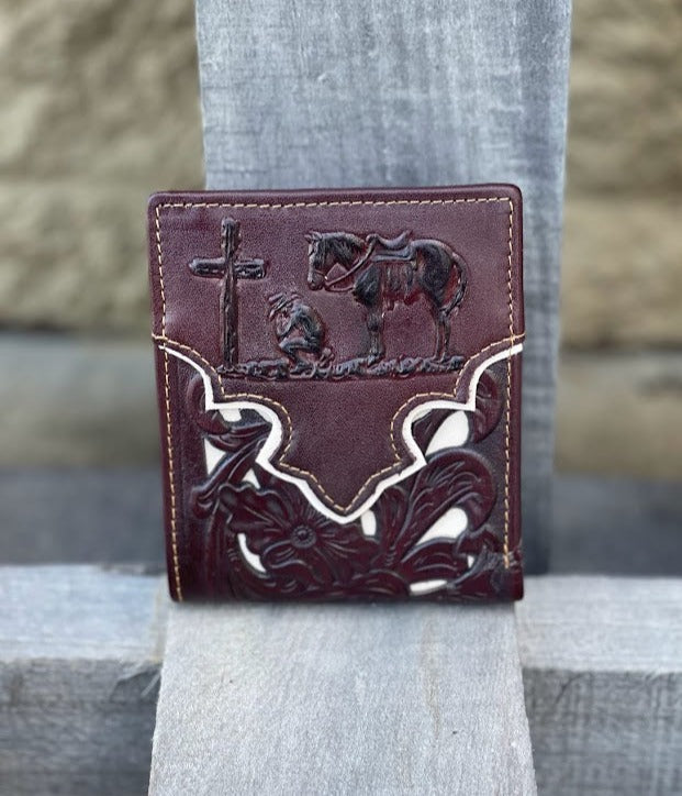 Bifold leather wallet in a Coffee Brown and beige inlay, featuring an embossed design of a Praying Cowboy. Front View