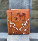 A light brown bifold leather wallet with a beige inlay design and a praying cowboy design. Front View