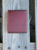 Brown bifold leather wallet with Beige inlay featuring a embossed Praying Cowboy design.  Rear View