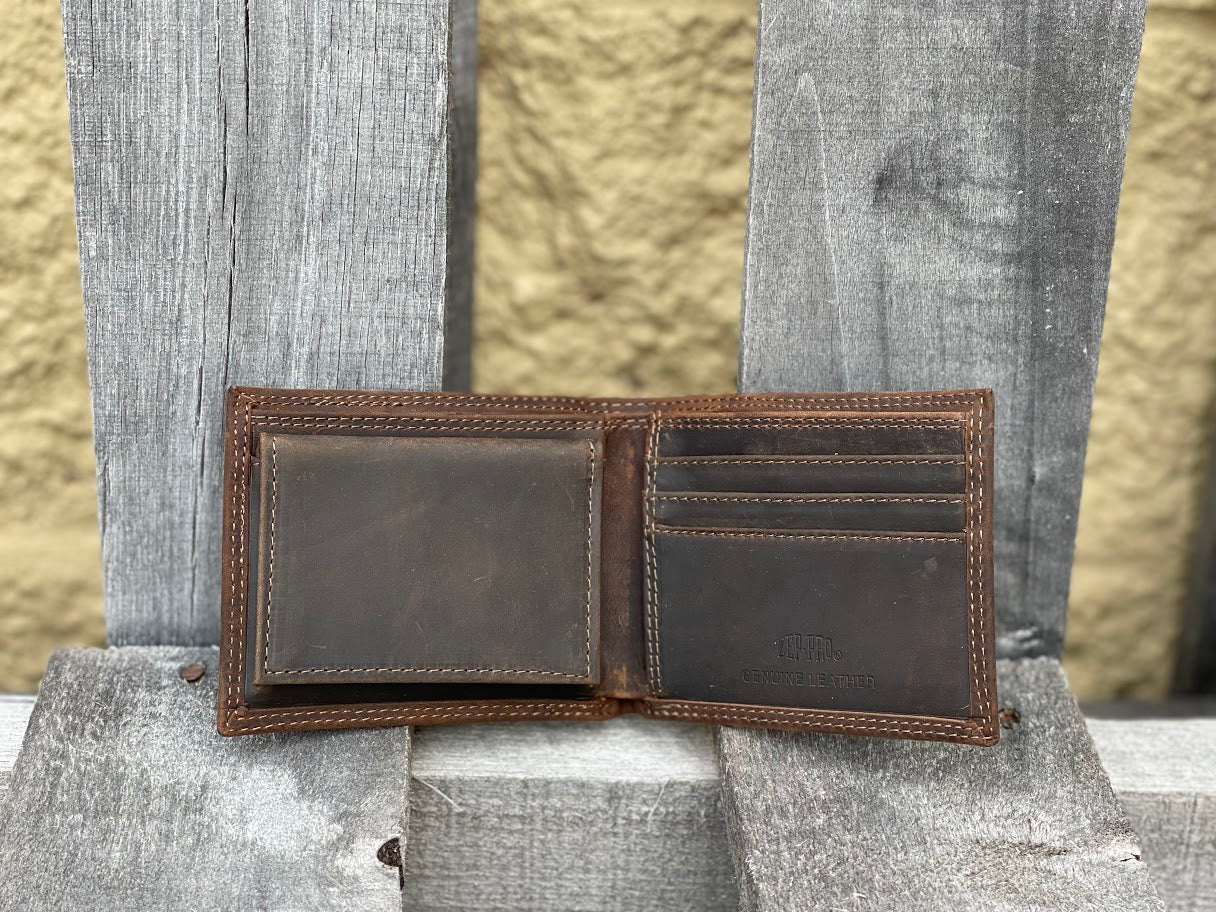 Zep-Pro Mississippi State University 1/2 Mossy Oak Camo/Brown Leather Bi-fold Wallet. Inside view shows:
Brown distressed leather
3 interior credit card slots
2 interior pockets
1 pullout ID case
2 bill-cash compartments