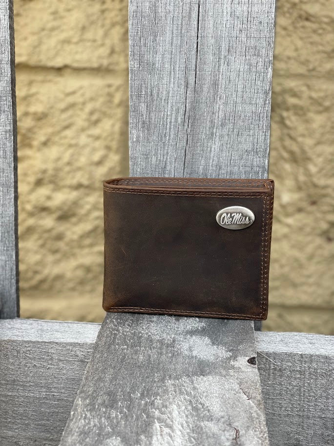Zep-Pro brown "crazy horse" leather bifold wallet with an "Ole Miss" logo brass concho on the top right.  Front view.