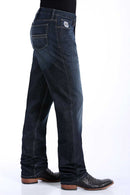 Side view of Cinch Silver Label dark wash jeans. Shows detail of right front coin and hip pockets, back pocket, and slim fit with straight leg on boots.