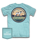 Fieldstone branded seafoam green short sleeve pocket t-shirt with a custom graphic print of a dog and the sky in the background. The text 'Fieldstone' across the bottom. The front left chest pocket has the fieldstone logo on it.