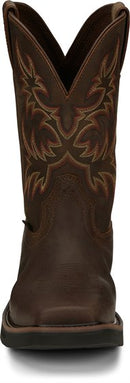 A front view pair of Justin Men's 11" Steel Toe Driller work boots in rugged tan color with a square toe style and decorative stitching. 