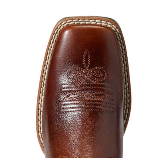 Women's Ariat Edgewood Western square toe boot in Dark Luggage with a Bitter Chocolate shaft. Close up of square toe showing toe bug and wrinkle, as well as double row stitching on welt of outsole. 