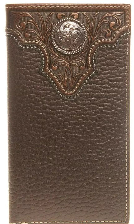 A dark pebbled brown leather wallet with a brown tooled overlay and an ornate silver tone concho on the front.