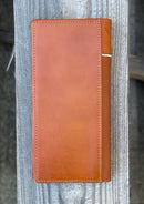 Light Brown tall leather wallet with Beige inlay and a embossed Praying Cowboy design.  Rear View