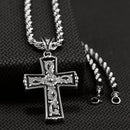The silver tone chain is a small rope style with a western scroll on black background cross. 24" long.