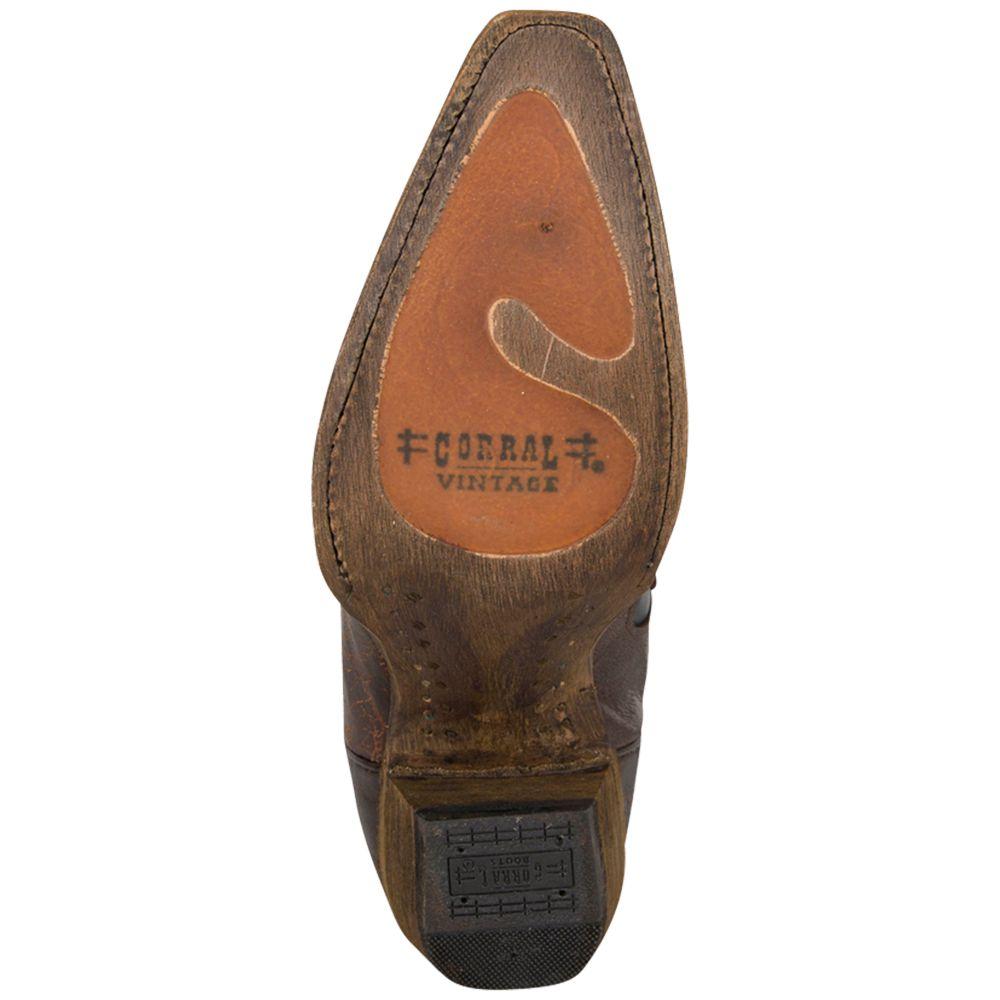 Women's brown leather snip toe boot with bone embroidery design. Outsole View 
