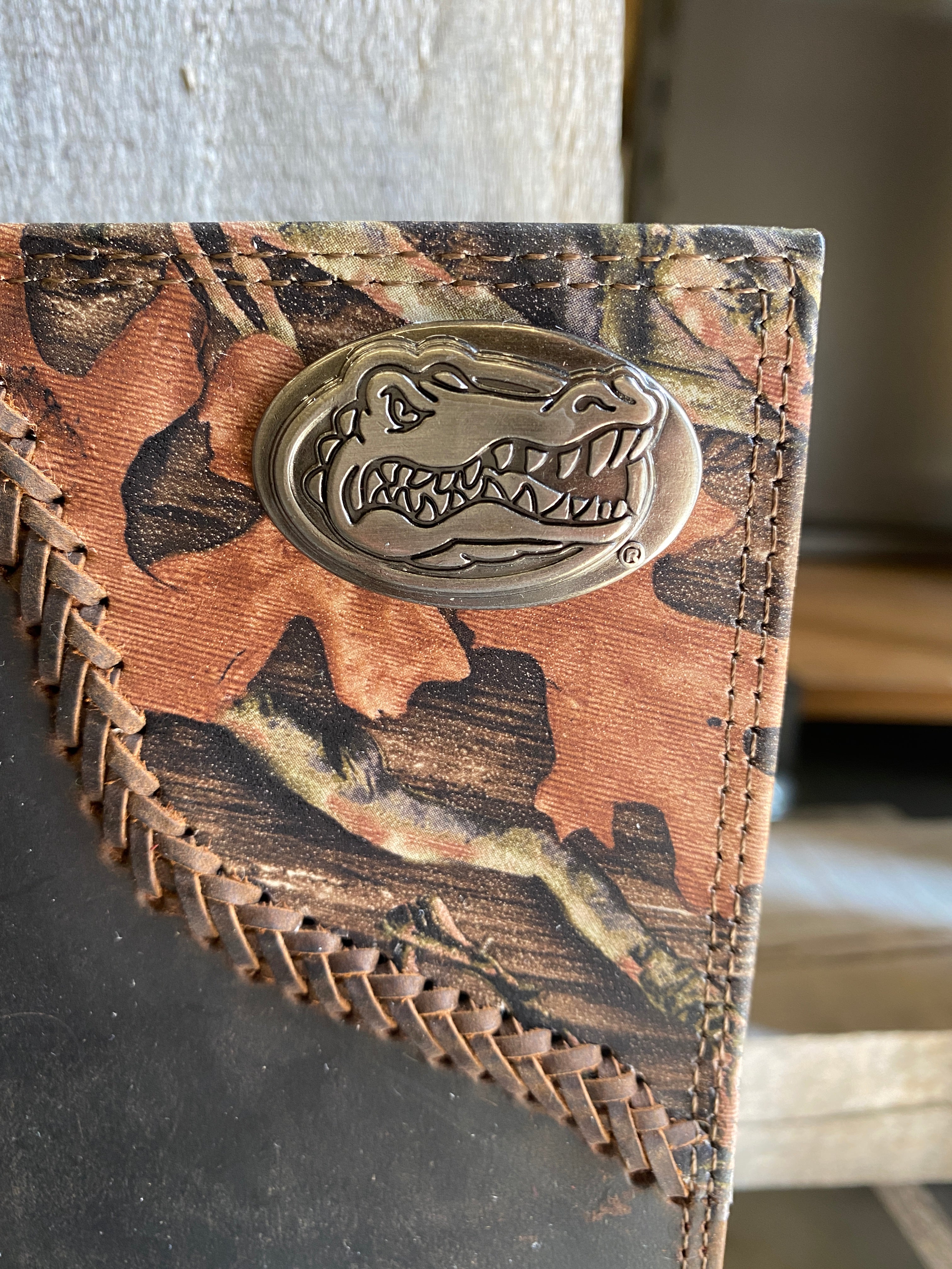 Zep Pro University of Florida 1/2 Mossy Oak Camo Tall Wallet front view showing concho closeup.