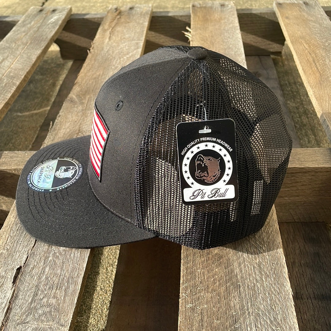 Black snapback cap with an embroidered American flag patch on the front and a mesh back. Side View 