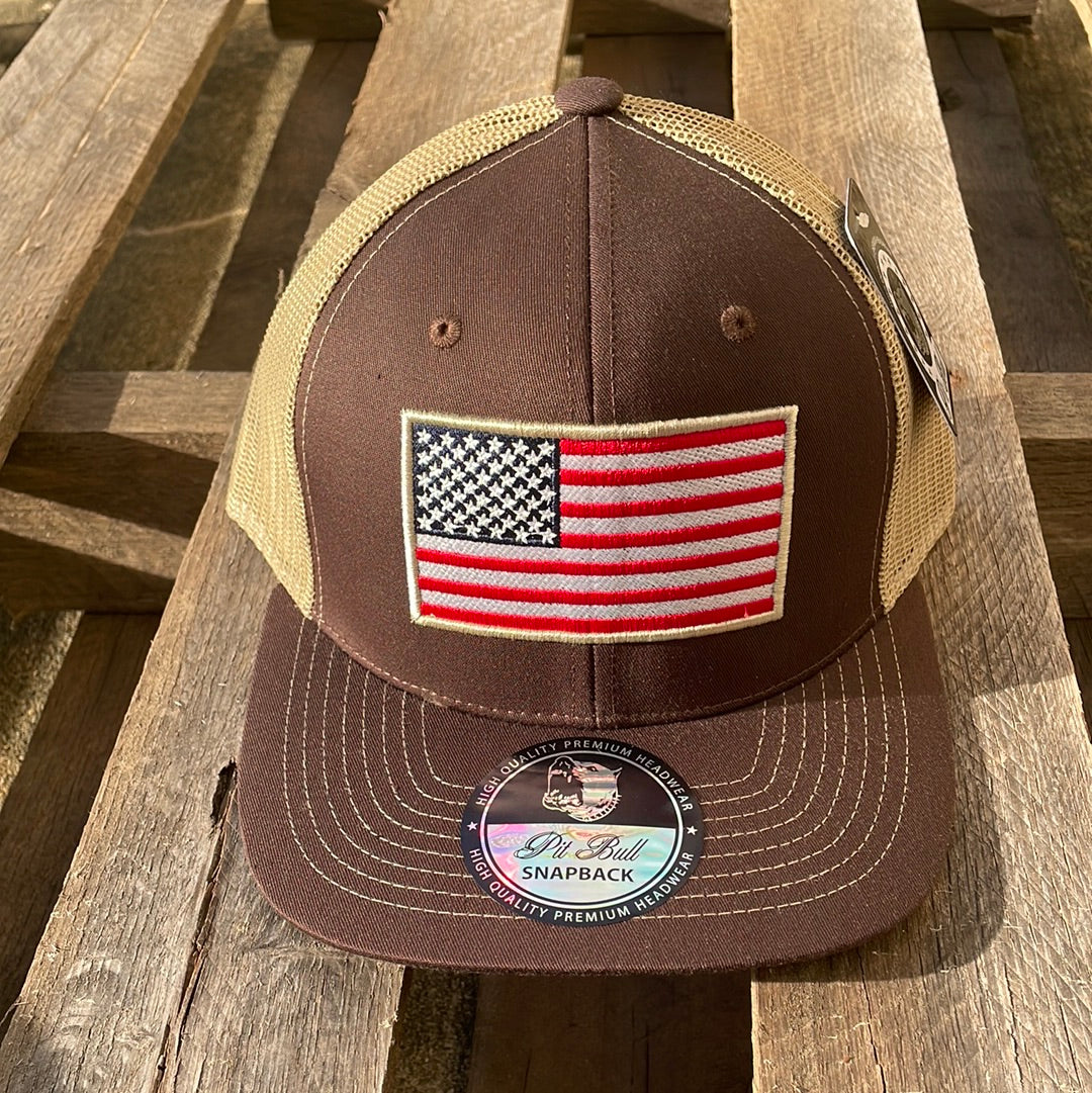Brown and khaki snapback cap with an embroidered American flag patch on the front and a Khaki mesh back. Front View 