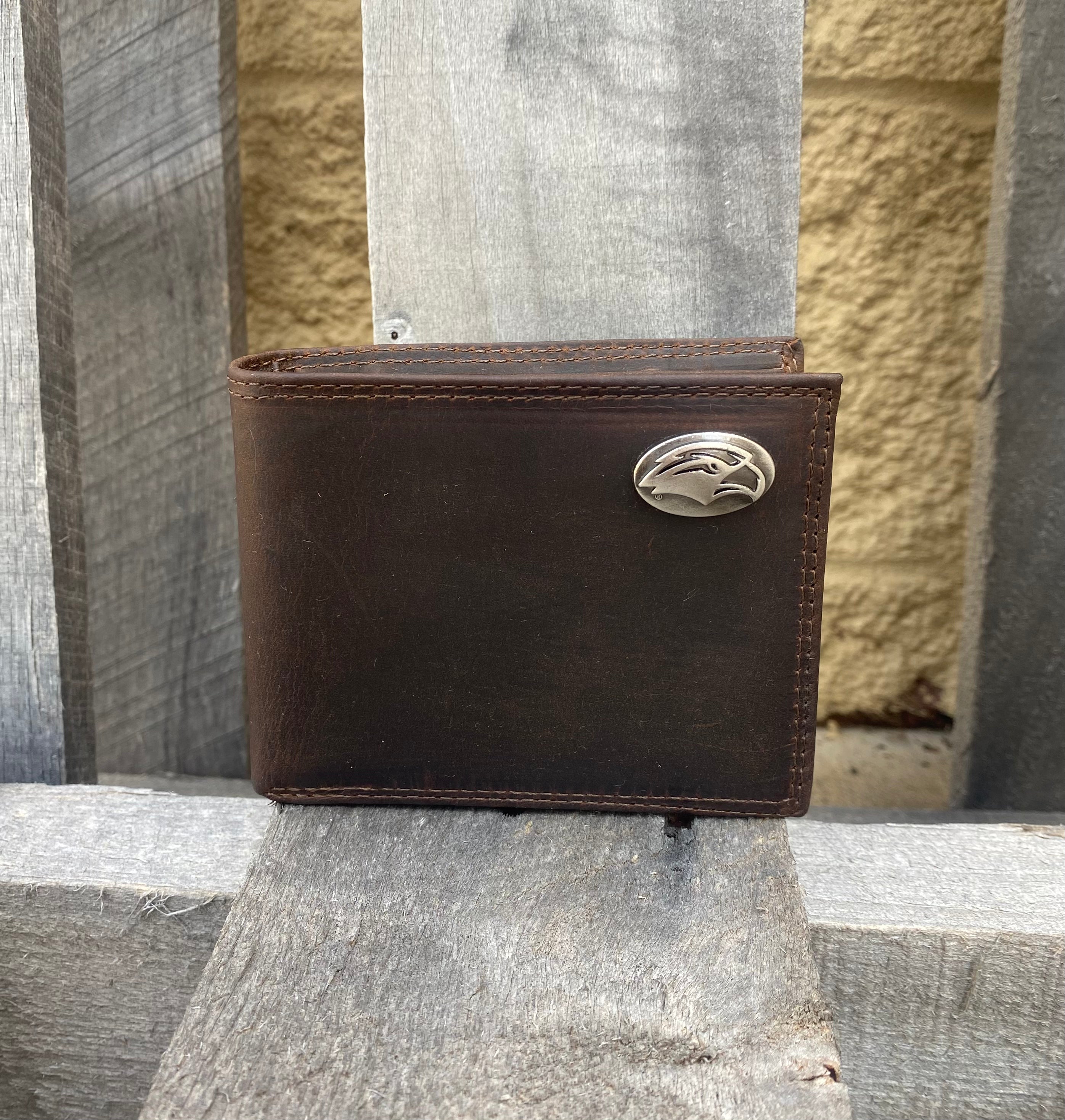 Zep-Pro University of Southern Miss Brown “Crazy Horse” Leather Bifold Wallet with an Golden Eagle logo brass concho on the top right.  Front view.