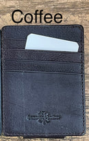 A brown full grain leather money clip from Top Notch Accessories, featuring six card slots. 