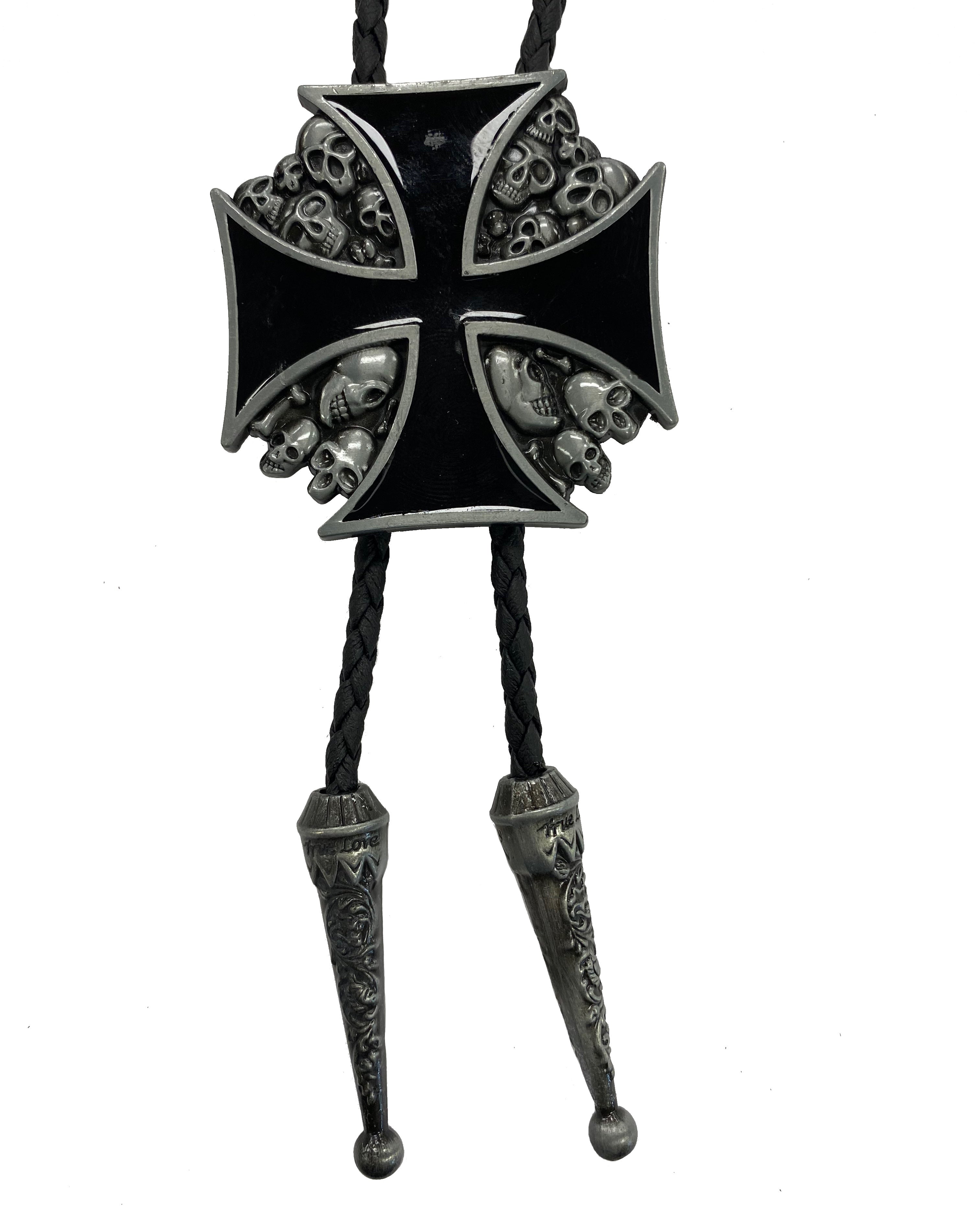 This bolo tie features a Black Cross on a background of Silver skulls. It has a Black braided cord with metal tips and is fully adjustable.