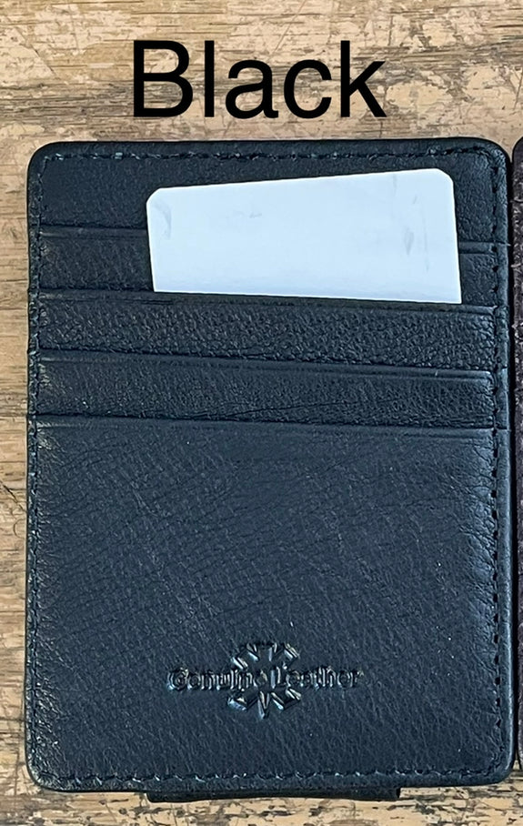 A black full grain leather money clip with seven total  card slots. 