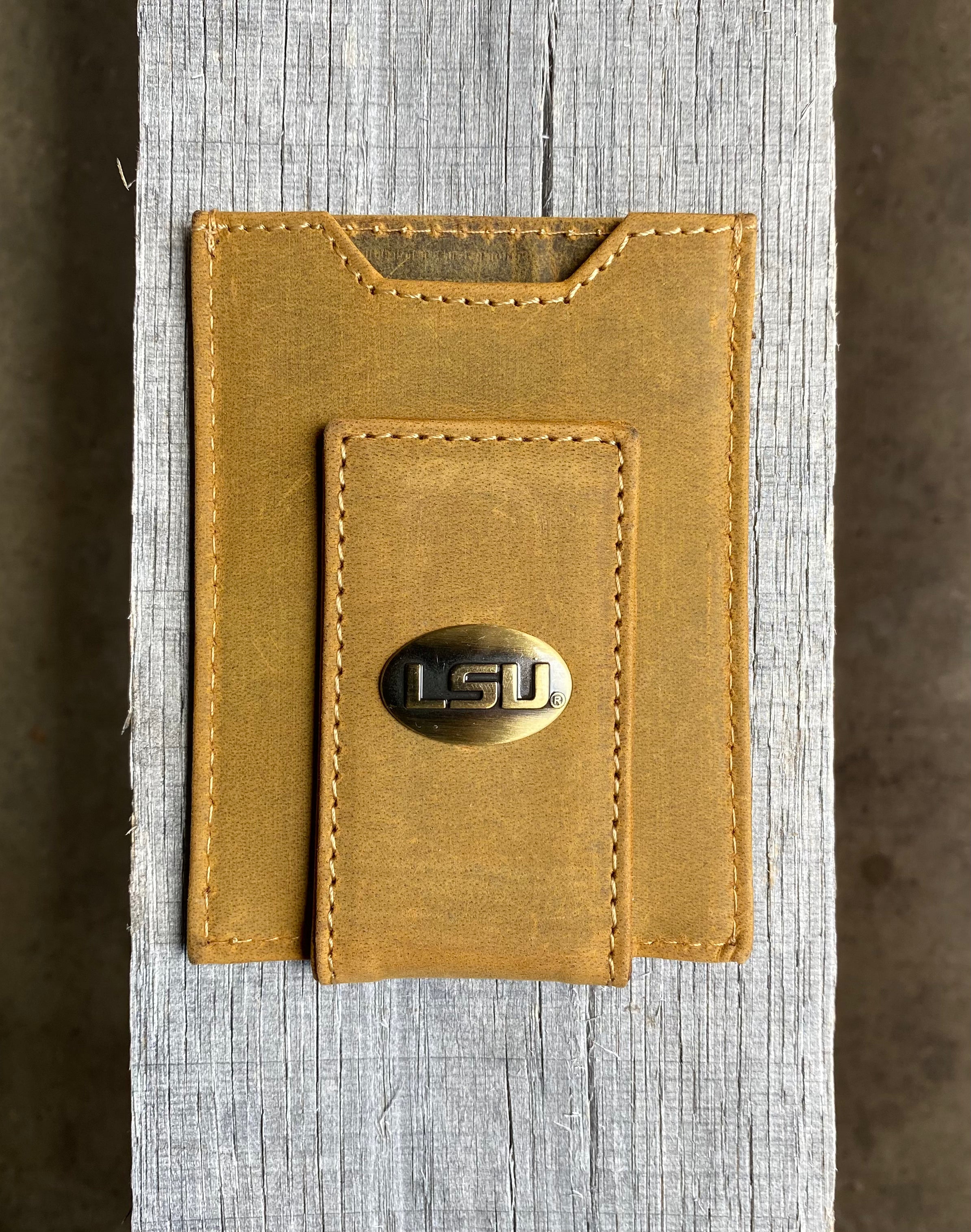 Zep Pro Louisiana State University Tigers Vintage Tan Leather Front Pocket Wallet. Front view features LSU logo brass concho on cash magnetic closure tab.