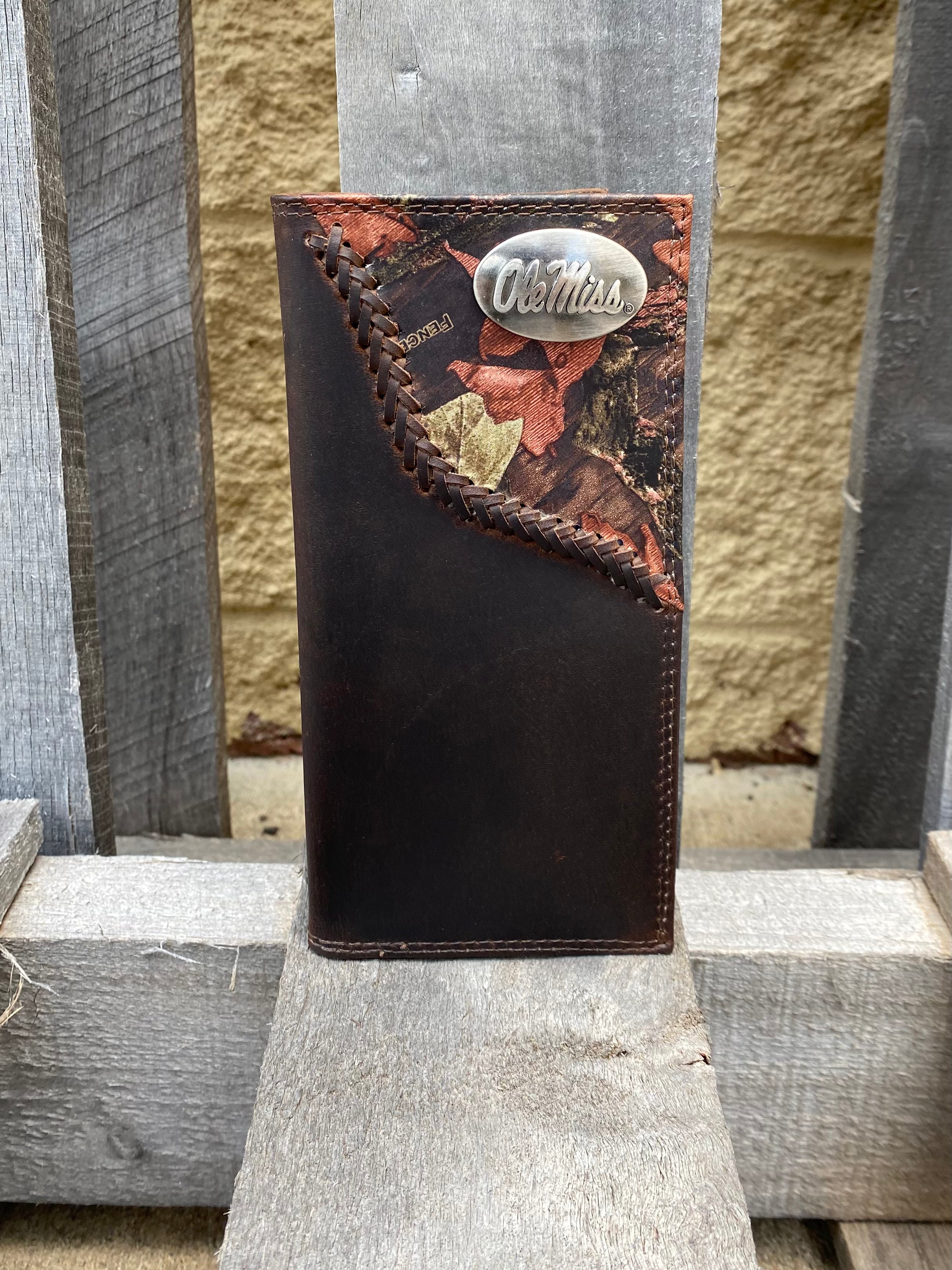 Zep-Pro University of Mississippi 1/2 Mossy Oak Camo Leather Tall Wallet front view shows Ole Miss logo oval brass concho on top right.