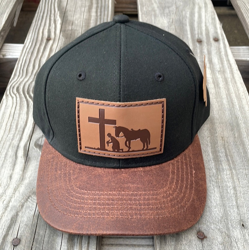 Cambridge Praying Cowboy Leather Patch/Leather Bill Black Snap Back Cap