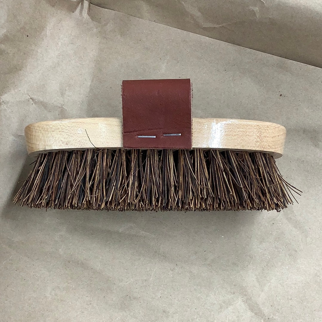 A Wright Bernet animal grooming brush with a wooden handle and brown bristles.