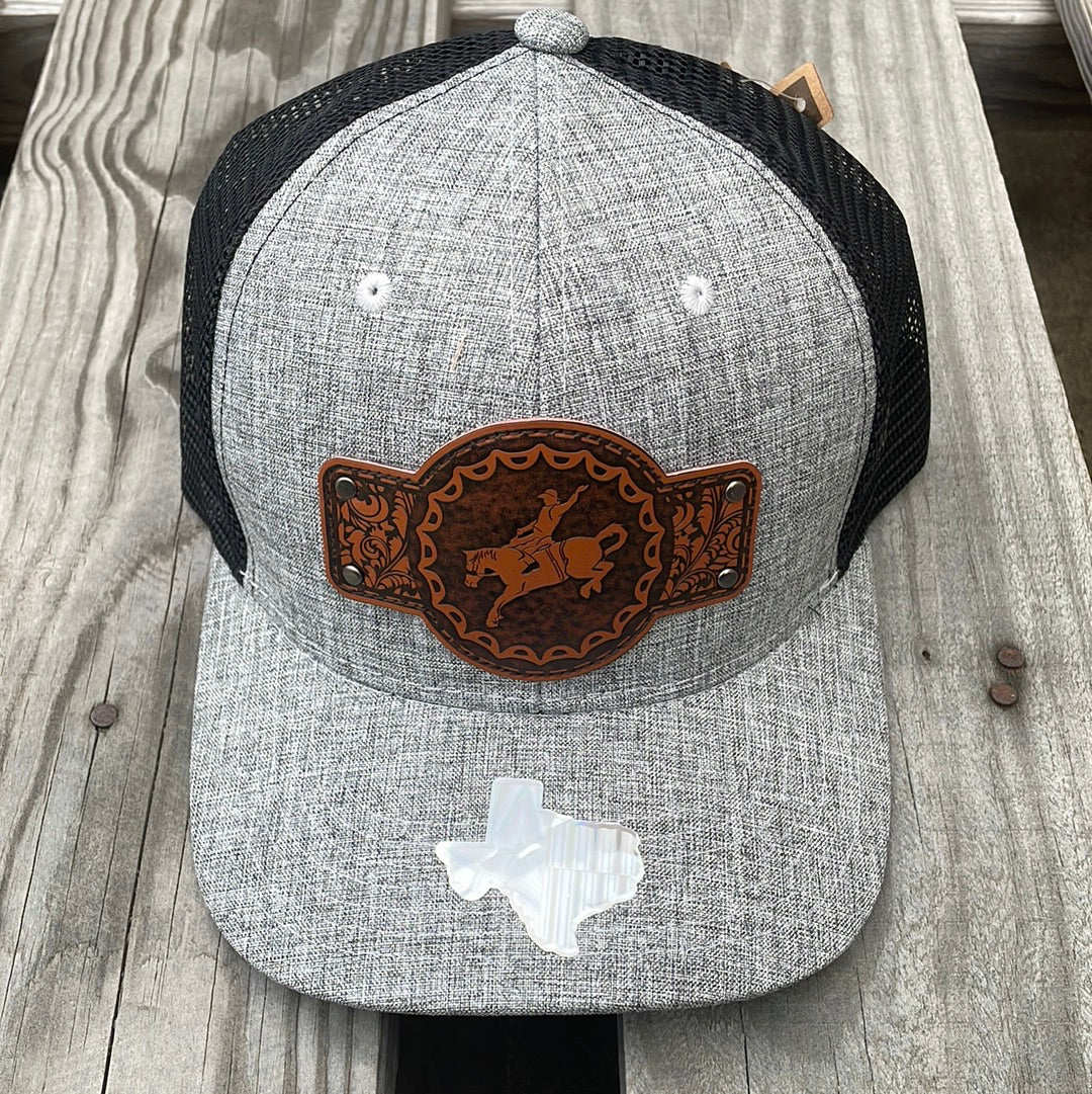 Heather Grey snapback cap with Black mesh back featuring a leather Bronc Rider patch. Front View 