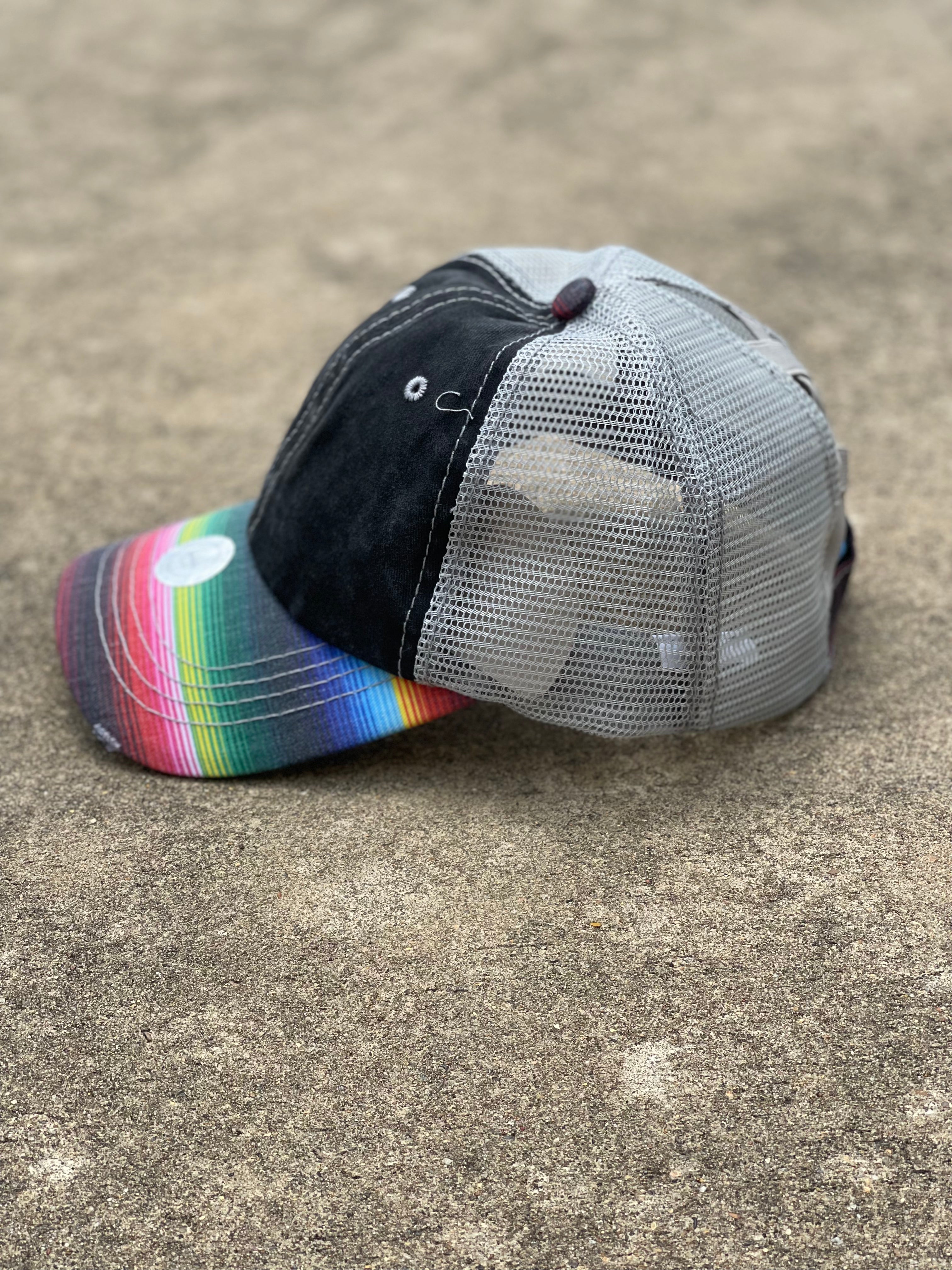 Serape brim, distressed black cap with grey mesh back featuring a crisscross stretch panel for your hair. Side View