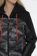 Women's Cinch ski jacket in Black and a Grey geometric print and Heather Red hood pull strings. Close up of left chest pocket showing zipper close on pocket. 