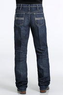 Men's White Label Dark Wash jeans back view showing detail of back pockets, belt loop placement, relaxed fit on seat and leg, stack on boots.
